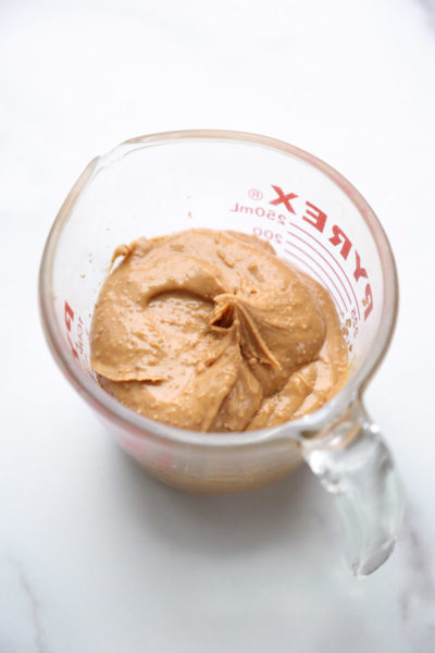 peanut butter in a measuring cup