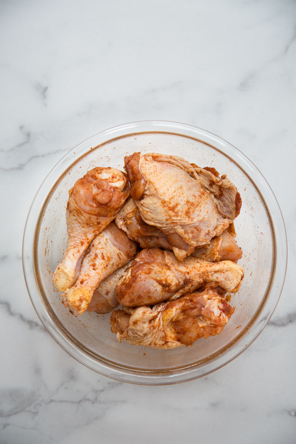 gluten-free chicken covered in spice rub in a bowl