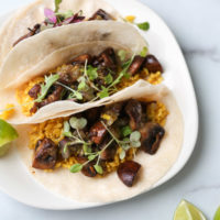 Mexican Mushroom tacos with yellow rice on a plate
