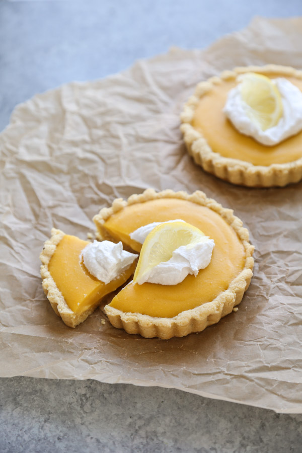 gluten-free dairy-free lemon curd tart with slice cut out