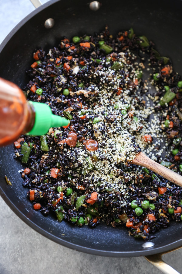 Fried Black Rice with egg in a wok