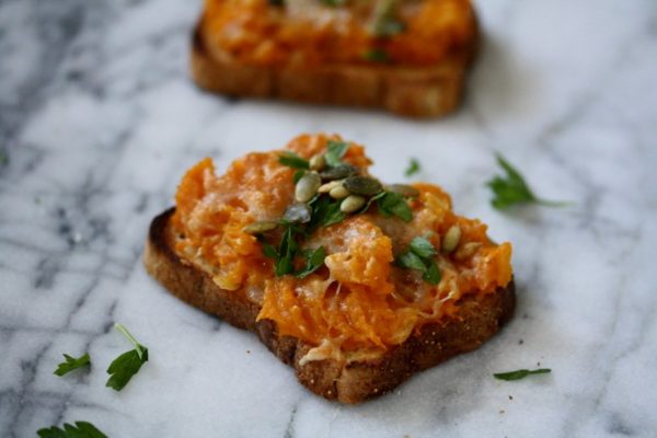 One of my favorite easy butternut squash recipes. Roasted squash toasts with Manchego cheese