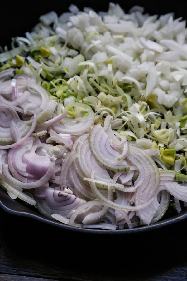 shallots leeks and onions in a skillet for french onion dip
