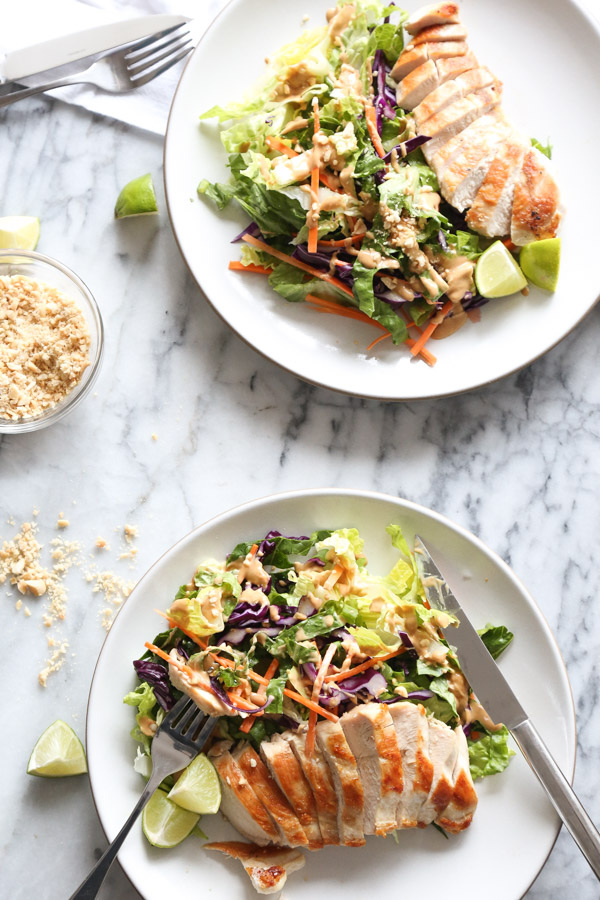 This Easy Asian Chicken Salad Recipe combines carrots, cabbage + romaine with creamy peanut dressing - a crunchy, healthy version of Chinese chicken salad! | www.feedmephoebe.com