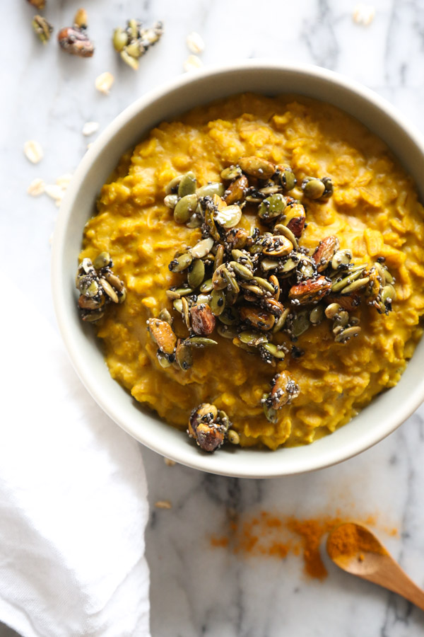This easy vegan oatmeal recipe uses turmeric-rich Golden Milk as the base, and is topped with pepita brittle. It's both vibrant, healthy and delicious!