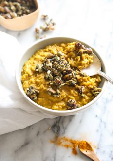 This easy vegan oatmeal recipe uses turmeric-rich Golden Milk as the base, and is topped with pepita brittle. It's both vibrant, healthy and delicious!