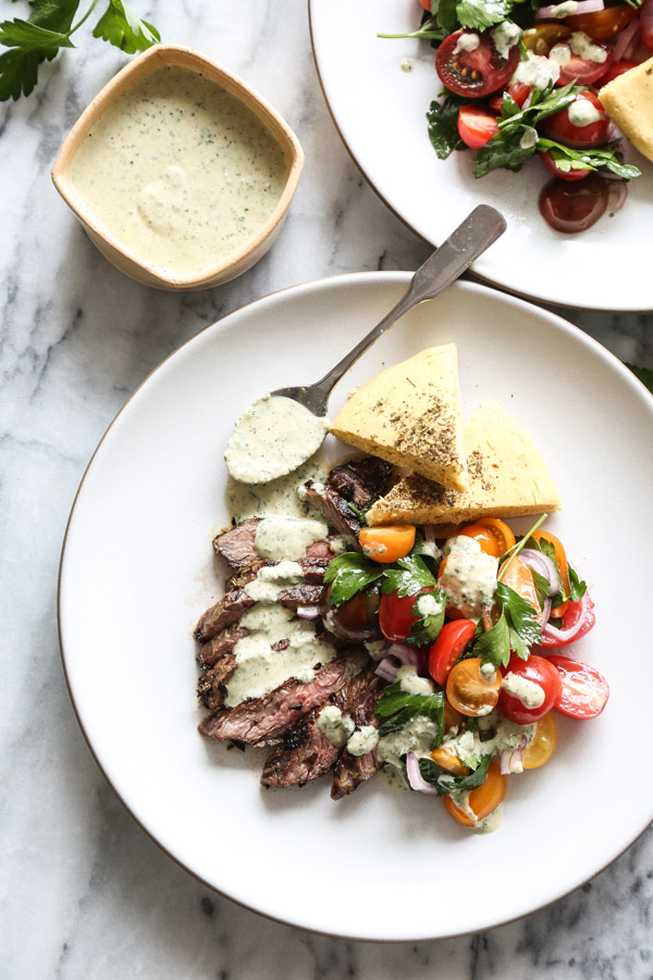 Homemade Herb Marinated Steak Gyros Plates with Tomato-Onion Salad, Gluten-Free Pitas, and Green Tahini-Yogurt Sauce | Get the healthy recipe on www.feedmephoebe.com