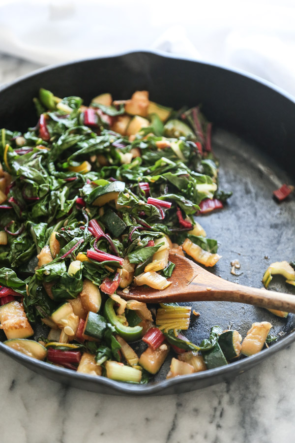 Green Israeli Shakshuka Recipe with Chard, Peas, and Zucchini | Feed Me Phoebe