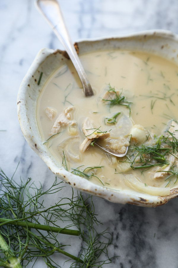 This version of Avgolemono Soup--the classic Greek lemon soup with egg broth--is simmered with fennel, quinoa and shredded chicken. Perfect for cold season! | Feed Me Phoebe