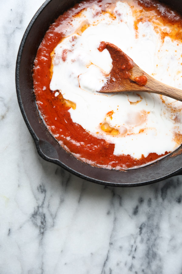 Masala-Style Baked Eggs in Purgatory - an Indian spin on the classic Italian baked egg recipe with coconut cream, garam masala and cumin. An easy fast recipe for a vegetarian dinner or weekend brunch. | Feed Me Phoebe