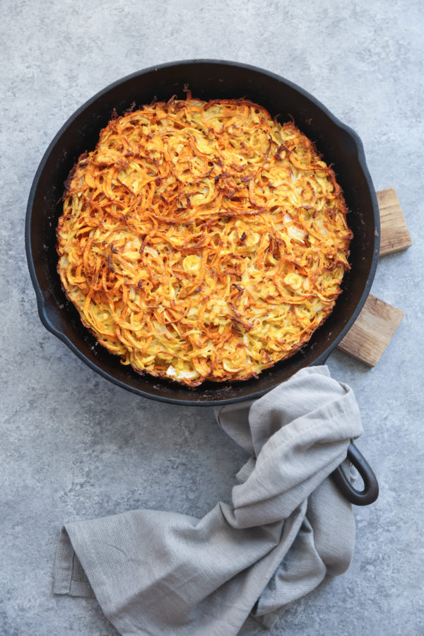 This healthy sweet potato kugel recipe is made gluten-free and paleo with coconut flour. The potatoes and parsnips are also spiralized - so no grating!