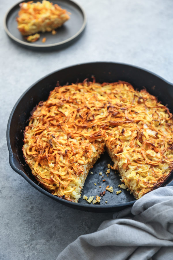 This healthy sweet potato kugel recipe is made gluten-free and paleo with coconut flour. The potatoes and parsnips are also spiralized - so no grating!
