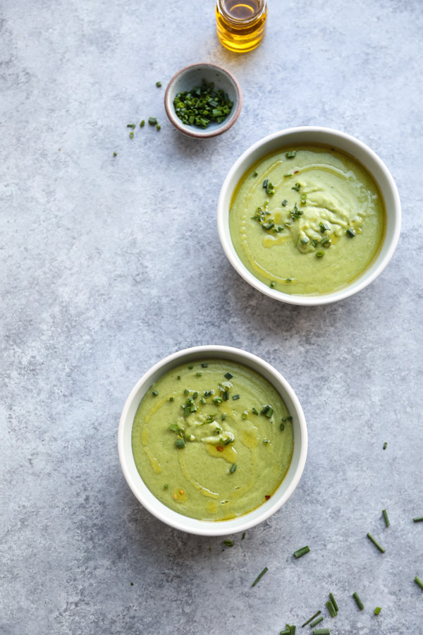 Bowl of Easy Creamy Parsnip Soup with Three Herbs and Garlic Oil 