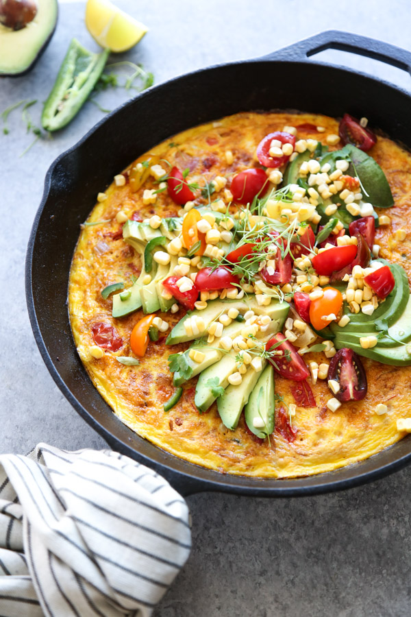 Mexican Frittata with Avocado, Corn and Tomatoes in a Skillet