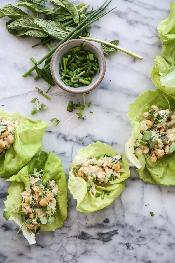 chickpea salad in a lettuce cup wrap on marble