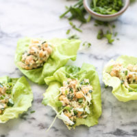 chickpea salad in a lettuce cup wrap on marble