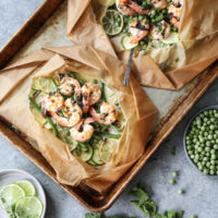 shrimp boil packet on a sheet pan with lime