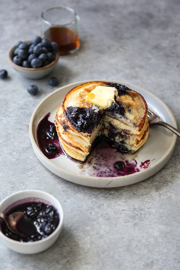 stack of blueberry pancakes on a plate