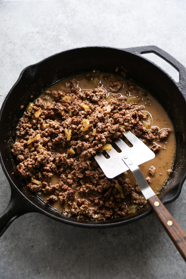 white bolognese sauce in a skillet