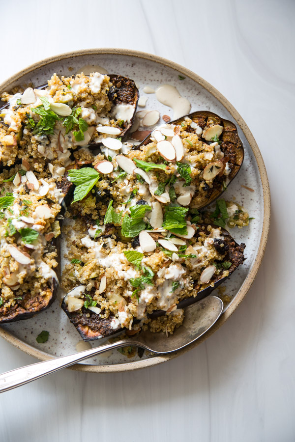 Ottolenghi-Style Baked Eggplant Recipe with Quinoa and Tahini on a platter