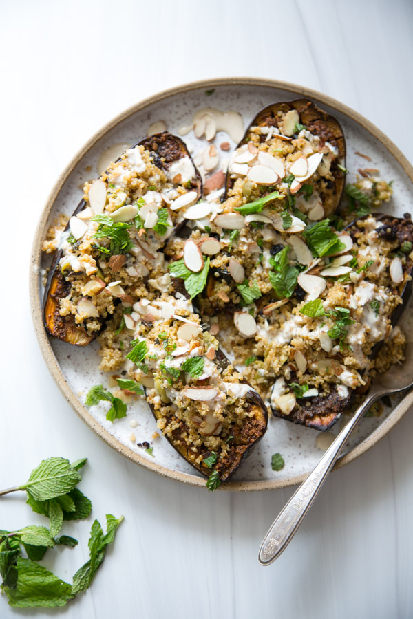 Ottolenghi-Style Baked Eggplant Recipe with Quinoa and Tahini on a platter (vegan, vegetarian, Low FODMAP Optional)