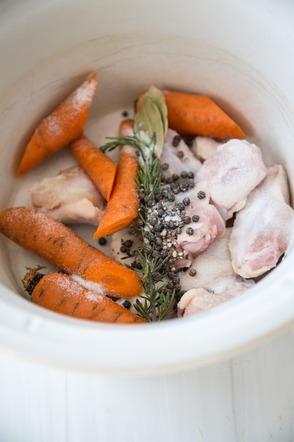 Ingredients for Gut-Healing Low FODMAP Chicken Broth in a slow cooker