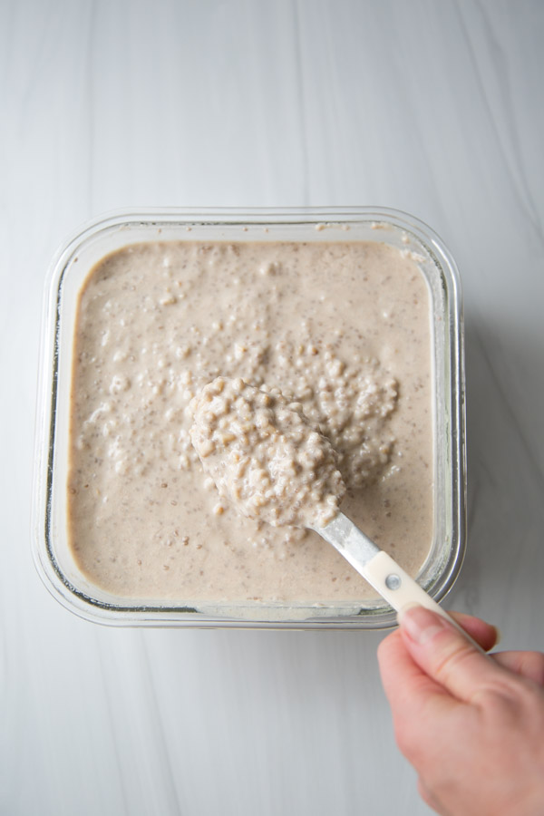 make ahead steel cut overnight oats that are super creamy in a tupperwear