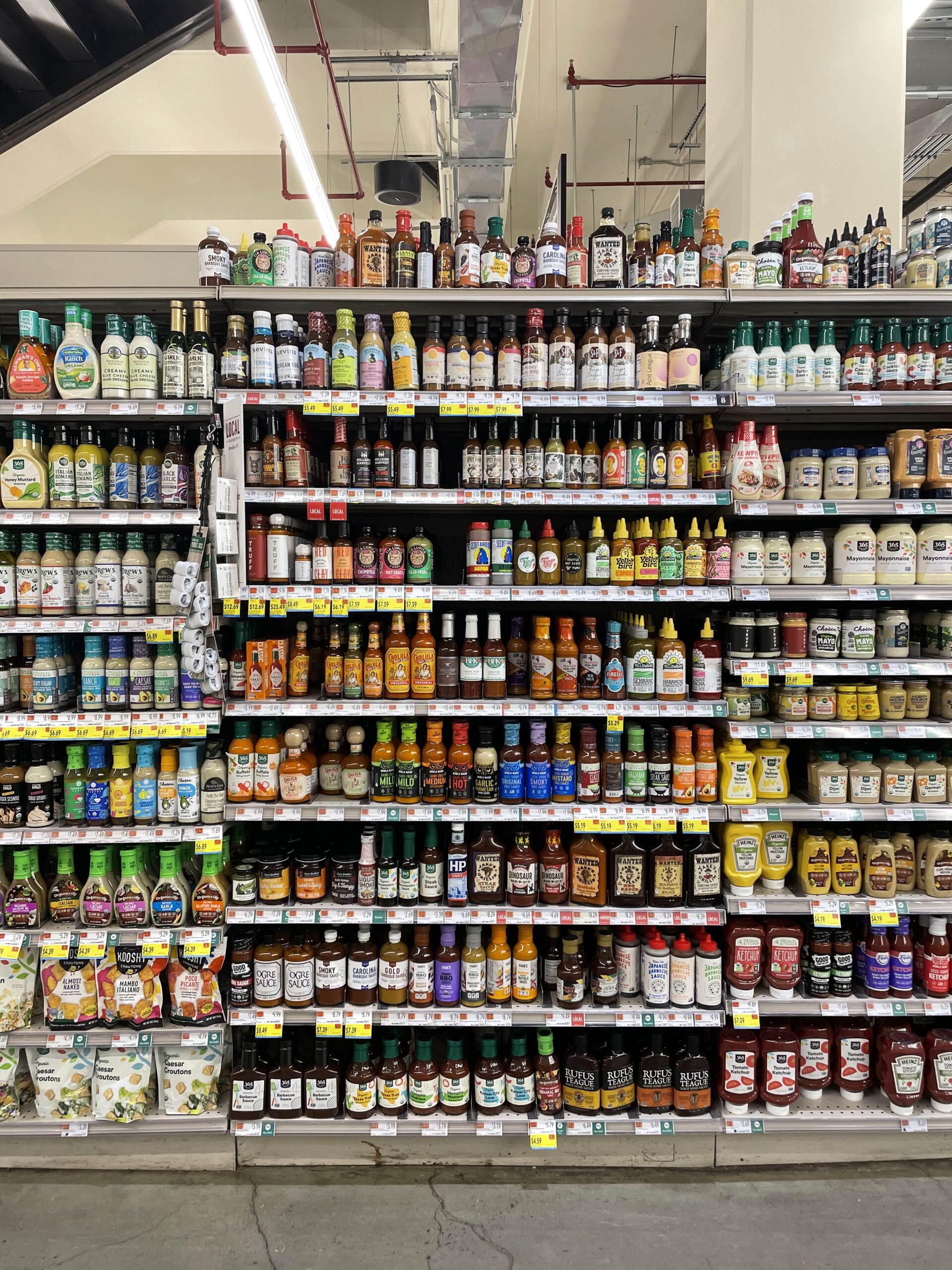 condiments on a shelf at the supermarket