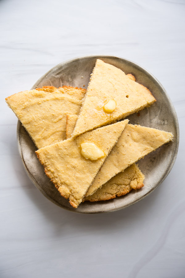 slices of savory gluten-free cornbread on a plate