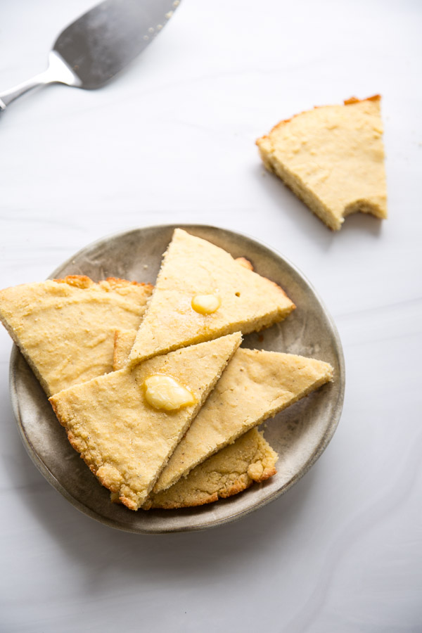 Slices of savory gluten-free cornbread on a plate