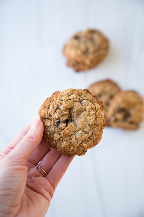 hand holding healthy almond flour and oatmeal cookie 
