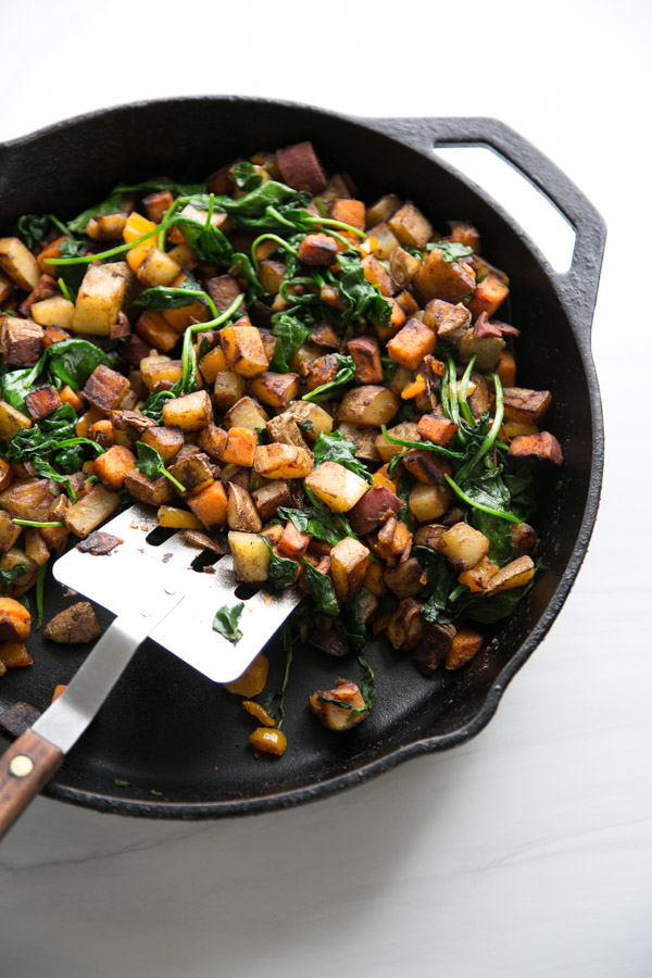 skillet with low fodmap breakfast hash and spatula
