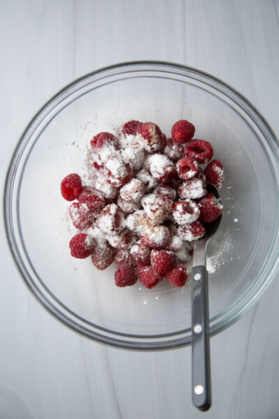 raspberries and sugar in a bowl