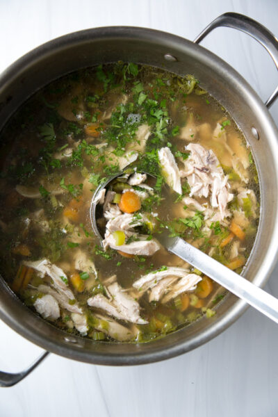 Jewish matzo ball chicken soup for passover seder in a pot