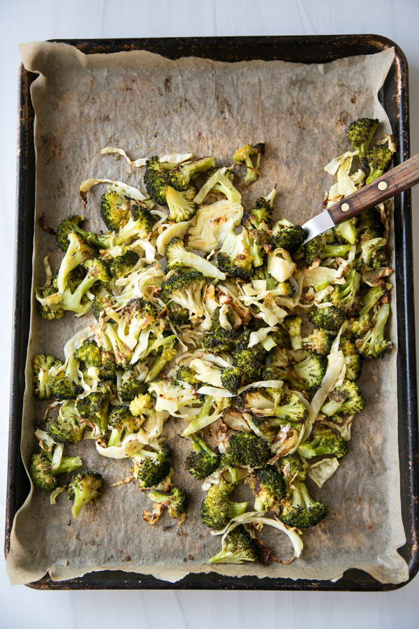 low fodmap roasted broccoli and cabbage on a sheet pan