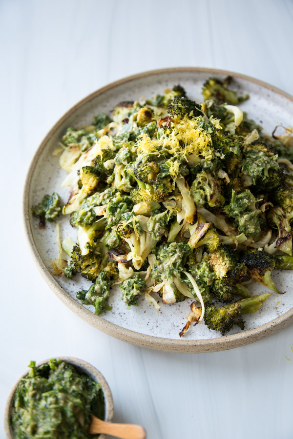 low fodmap roasted broccoli and cabbage on a platter 3/4 view