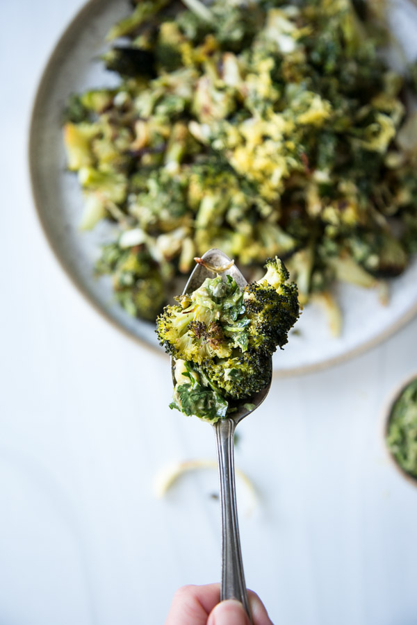 low fodmap roasted broccoli and cabbage on a spoon